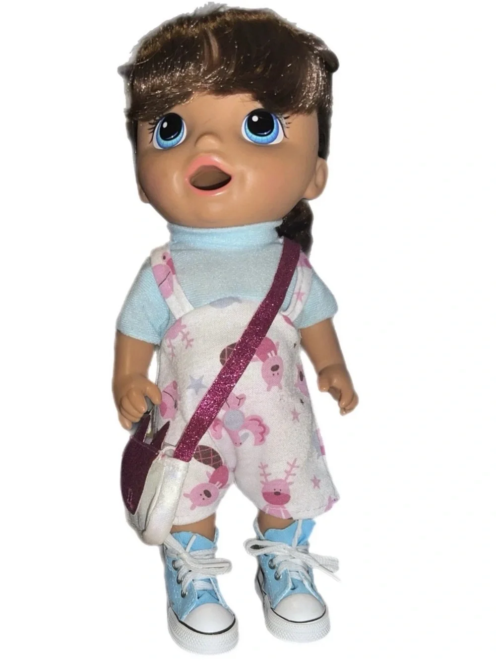 Dress-Up Baby Doll with Pink Floral Skirt and Blue Accessories
